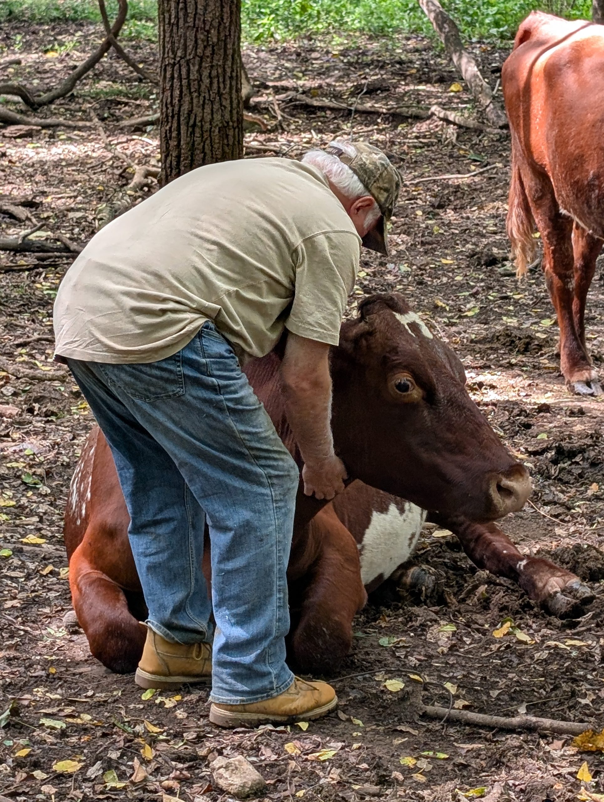 Sam hugs one of his girls